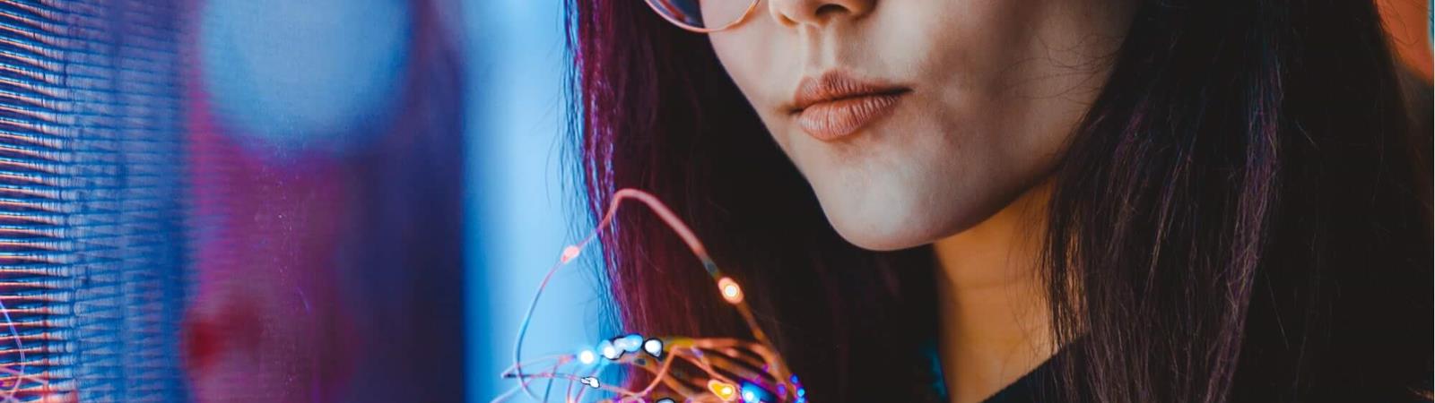 Girl holding lights